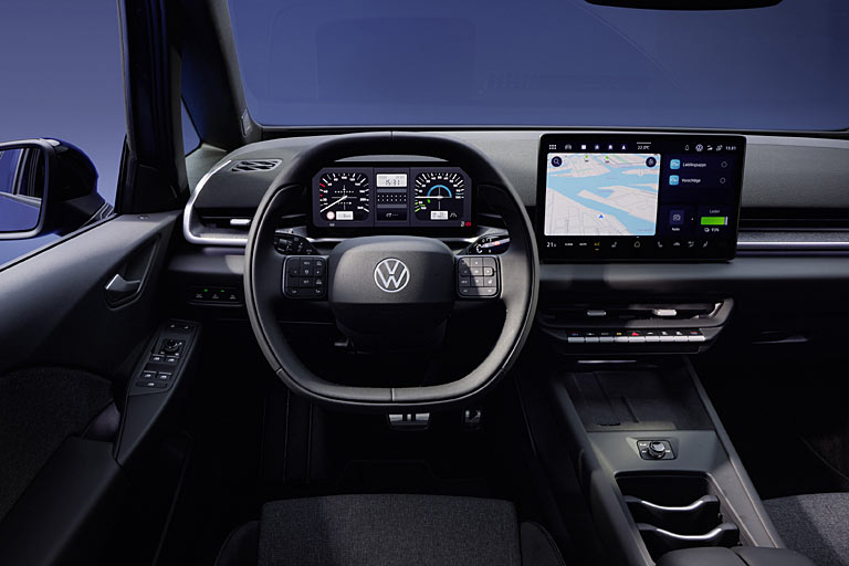 Die Instrumente lassen sich in einem Retro-Look wie im Golf I darstellen. Fein: Es gibt einen zentralen Lautstärkeregler mit Mute-Funktion. Schade: Es kann nur ein Handy geladen werden