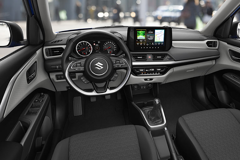 Blick ins Interieur: Neuer neun Zoll großer Zentralbildschirm mit kabelloser Handy-Anbindung als wichtigstes Merkmal. Die Handbremse bleibt mechanisch, &raquo;